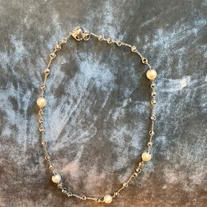 Di Modolo white gold and pearl necklace.